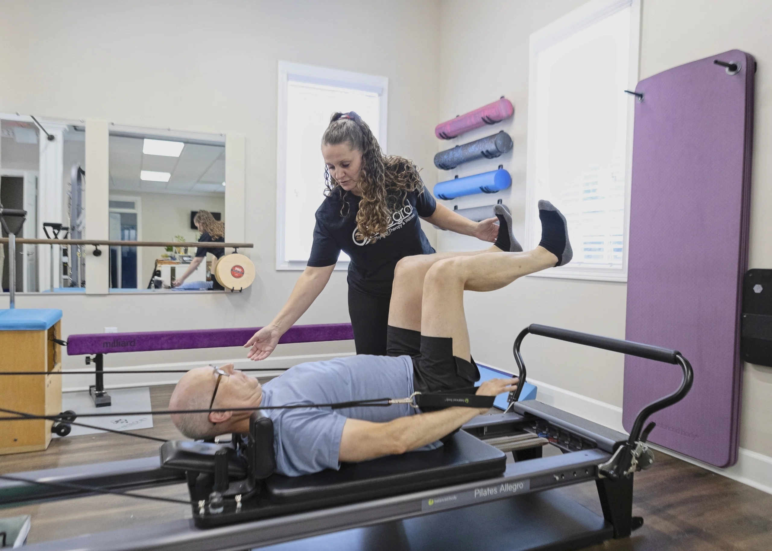 Dr. Lisa Shaw treats an adolescent with physical therapy
